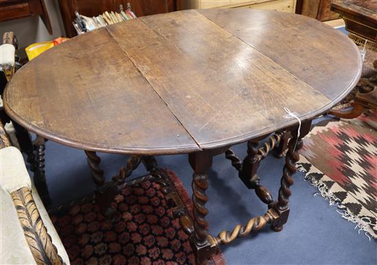 A 19th century gateleg barley twist table W.138cm extended